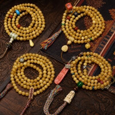 108-bead-golden-carved-charm-mala-main Golden Guardian Mala with 108 beads, layered wrap strands, and carved centerpiece
