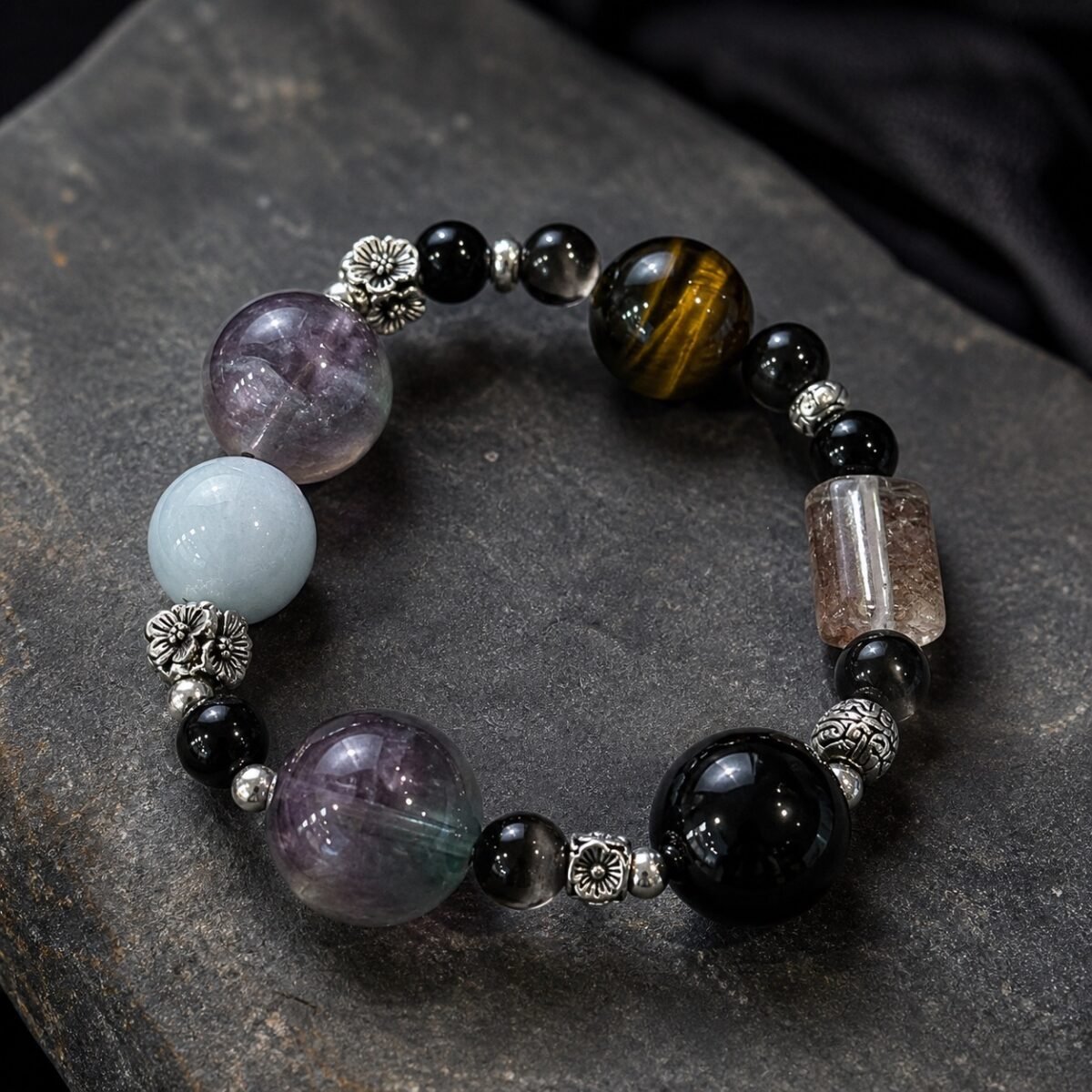 Protection gemstone bracelet with fluorite, obsidian, phantom quartz, tiger’s eye and aquamarine beads