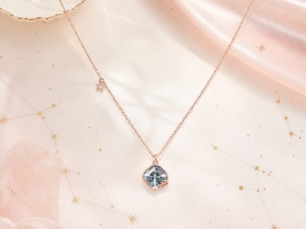 Cancer rose gold crystal zodiac necklace with clear faceted crystal and Cancer glyph