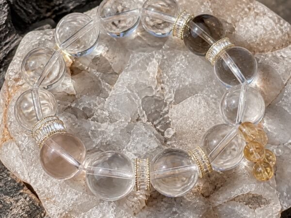 Clear Quartz Citrine Luck Bracelet with clear, golden and citrine-toned quartz beads
