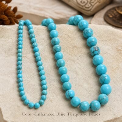 Color-enhanced blue turquoise beads with dark matrix-like patterns