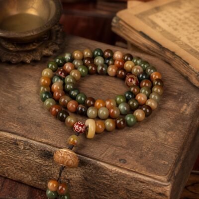 Three-Eye Lotus Mala with 108 jade, amber, and bodhi beads and lotus-inspired terminal
