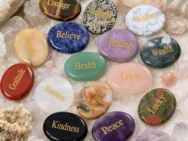 Engraved crystal palm stones with affirmation words