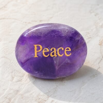 Amethyst palm stone engraved with Peace