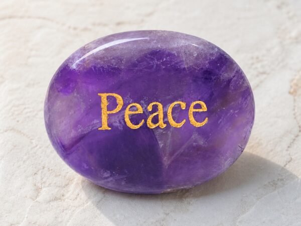 Amethyst palm stone engraved with Peace