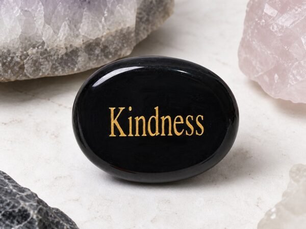 engraved-crystal-intention-palm-stone-collection-black-obsidian-kindness-01-main Black obsidian palm stone engraved with Kindness