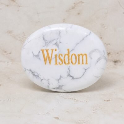 Howlite palm stone engraved with Wisdom