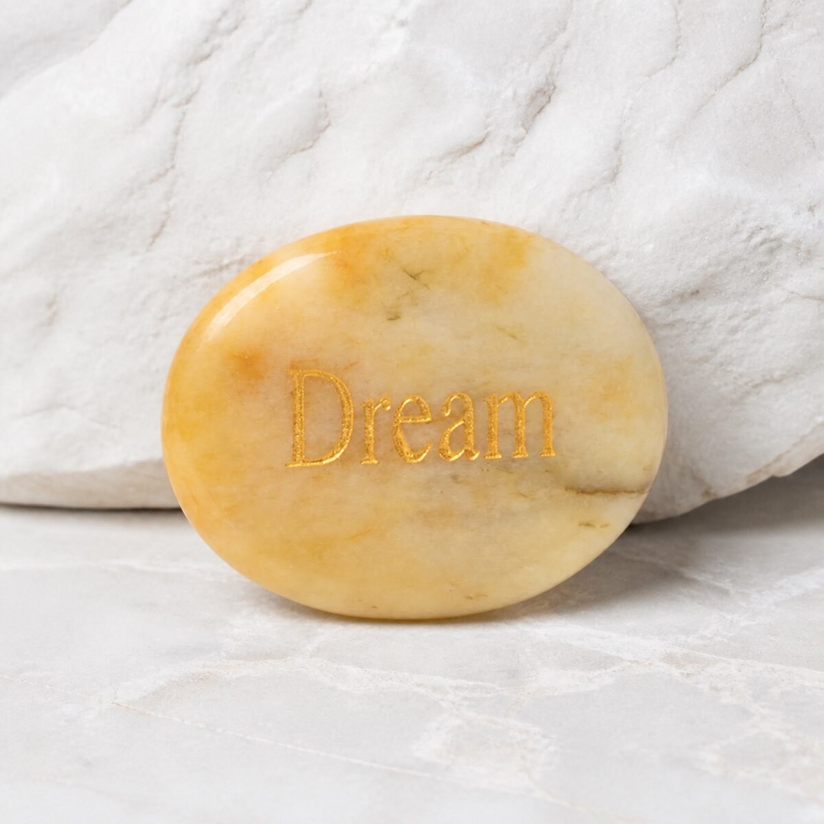 engraved-crystal-intention-palm-stone-collection-yellow-jade-dream-01-main Yellow jade palm stone engraved with Dream