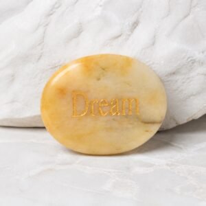 Yellow jade palm stone engraved with Dream