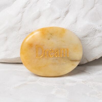 engraved-crystal-intention-palm-stone-collection-yellow-jade-dream-01-main Yellow jade palm stone engraved with Dream