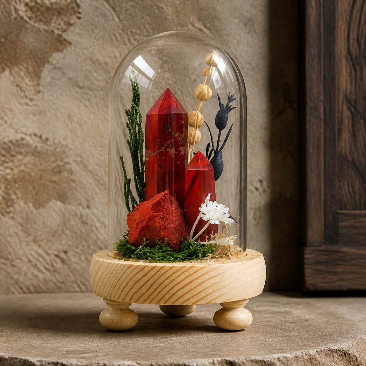 Red Jasper Dome with natural red jasper moss and dried botanicals beneath a glass dome