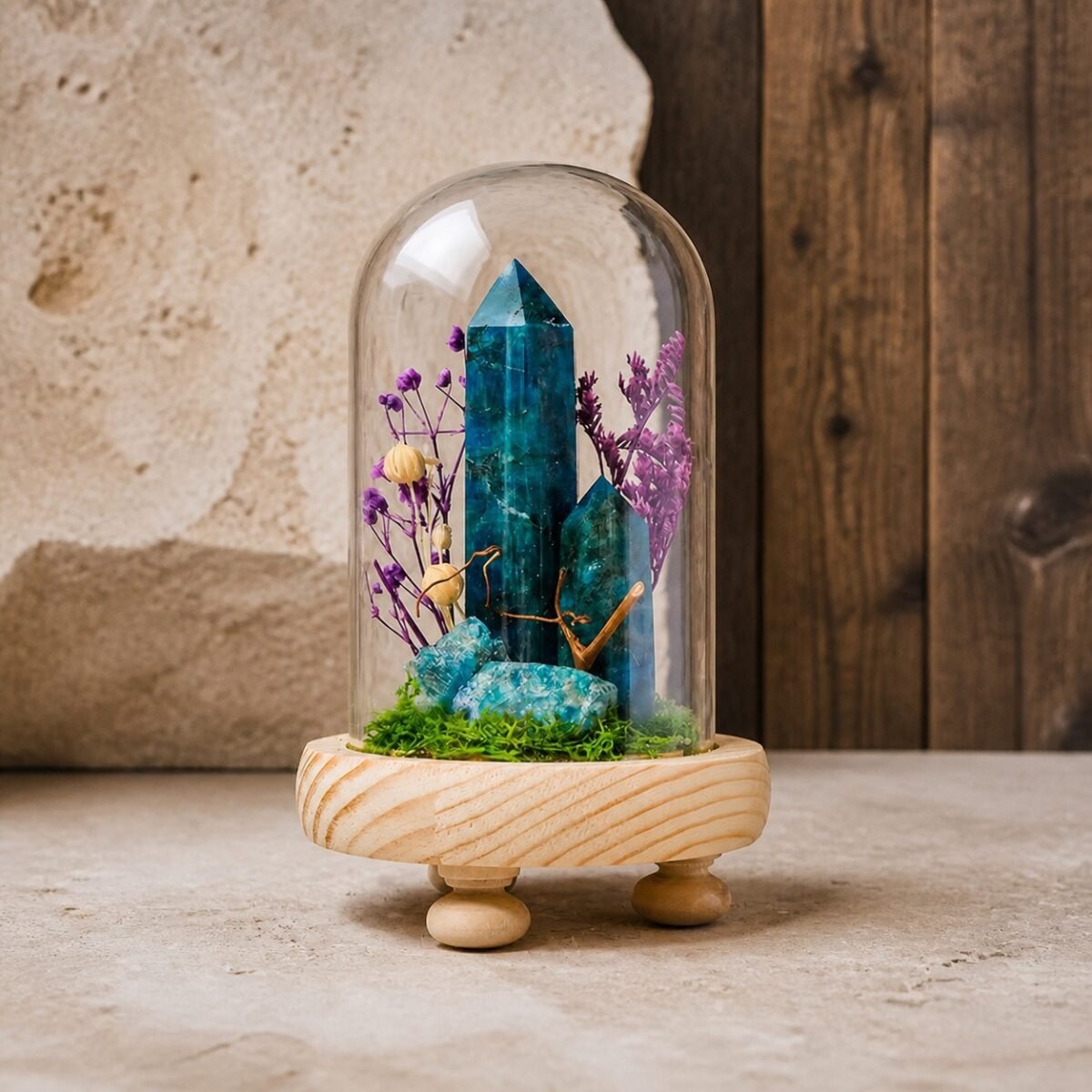 Blue Apatite Dome with natural blue apatite moss and dried botanicals beneath a glass dome