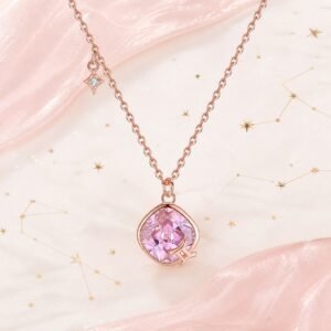 Gemini rose gold crystal zodiac necklace with blush-pink crystal and Gemini glyph