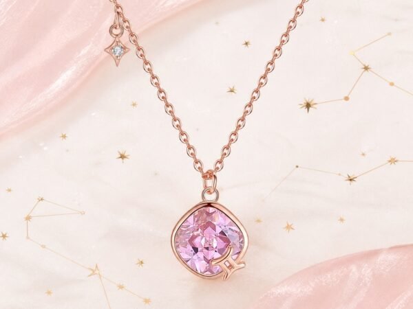 gemini-crystal-zodiac-necklace-01-product Gemini rose gold crystal zodiac necklace with blush-pink crystal and Gemini glyph
