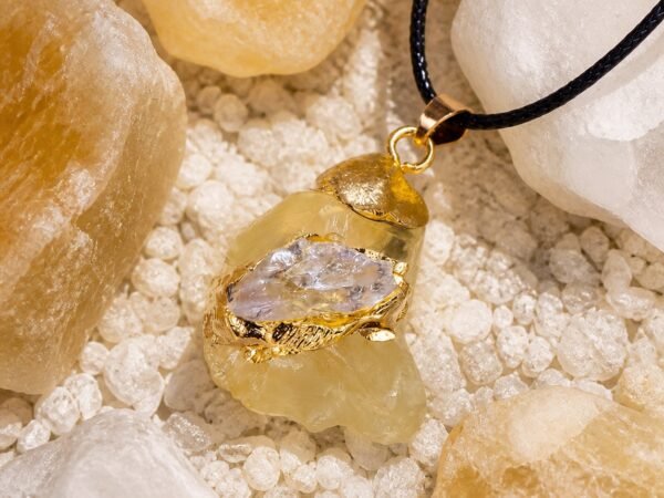Citrine raw crystal pendant with gold-tone wrap and black hand-braided cord