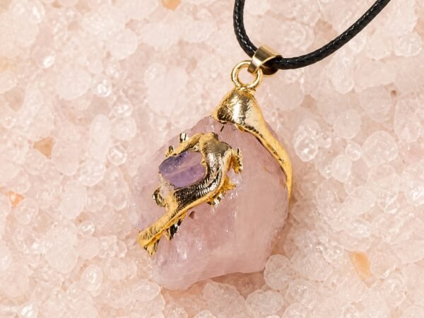 Rose quartz raw crystal pendant with gold-tone wrap and black hand-braided cord