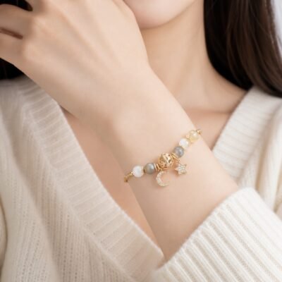 Hollow Orb Rutilated Quartz Moonstone Bracelet