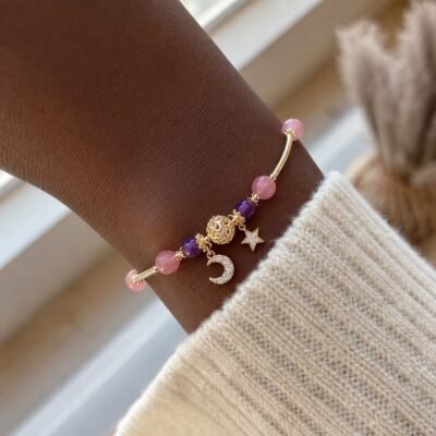 hollow-orb-strawberry-quartz-star-bracelet-02-black-wrist Hollow Orb Strawberry Quartz Star Bracelet