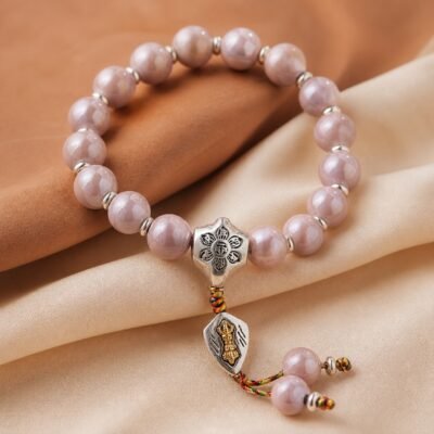 incense-ash-pink-porcelain-blessing-bracelet-01-main Pink Porcelain Blessing Bracelet with silver-toned charm and soft tassel