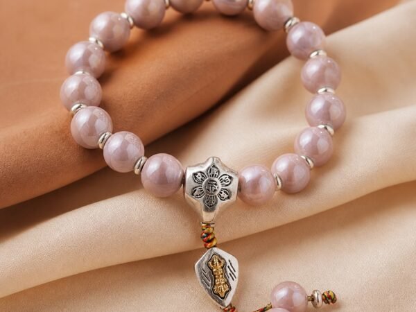 Pink Porcelain Blessing Bracelet with silver-toned charm and soft tassel