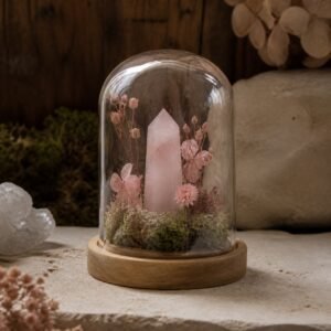 Pink Crystal Mini Dome with a pink crystal, moss, and dried botanicals beneath a glass dome