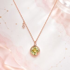 Pisces rose gold crystal zodiac necklace with pale yellow-green crystal and Pisces glyph