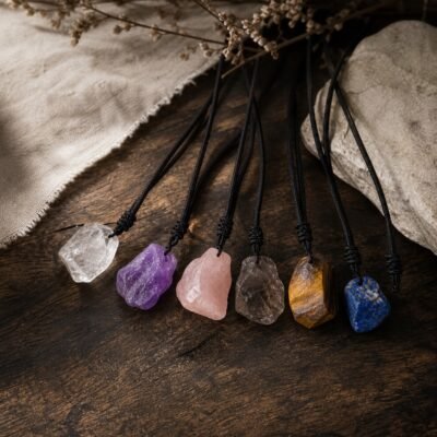 Raw crystal talisman pendant collection with natural raw-stone variations