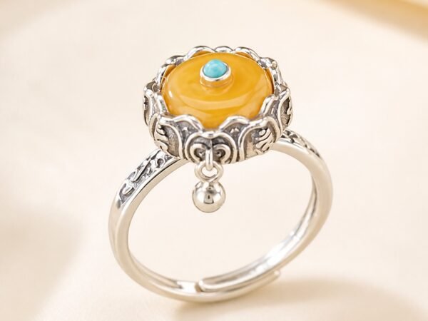 Rotating Prayer Wheel Protection Ring with amber centerpiece and S925 sterling silver band