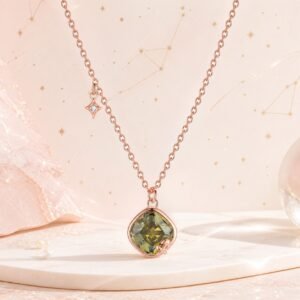 Sagittarius rose gold crystal zodiac necklace with olive-gold crystal and Sagittarius glyph