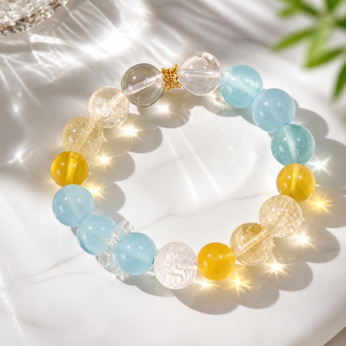 sunlit-calm-aquamarine-yellow-apatite-bracelet-01-main Sunlit Calm aquamarine bracelet with yellow apatite, yellow fluorite, and carved clear quartz beads