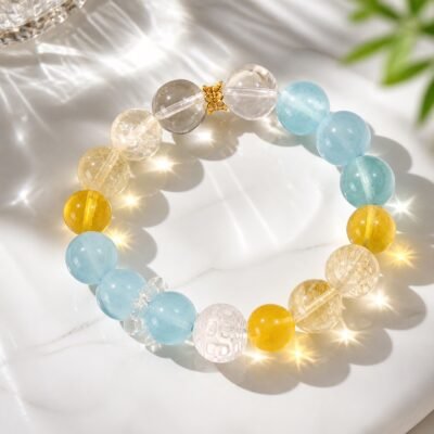 sunlit-calm-aquamarine-yellow-apatite-bracelet-01-main Sunlit Calm aquamarine bracelet with yellow apatite, yellow fluorite, and carved clear quartz beads