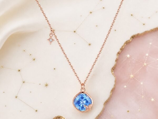 taurus-crystal-zodiac-necklace-01-product Taurus rose gold crystal zodiac necklace with sapphire-blue crystal and Taurus glyph