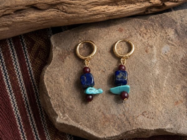 Lapis Turquoise Huggie Earrings with lapis lazuli, turquoise-colored decorative accents, and red beads