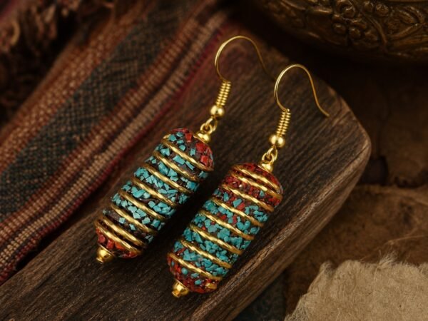 Tibetan Wrapped Cylinder Drop Earrings with a textured cylinder form and turquoise accent
