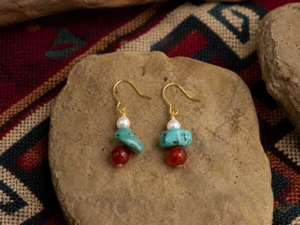 turquoise-coral-pearl-hook-earrings-01-main-hero Pearl Hook Earrings with lustrous pearl, turquoise-colored chip, red agate drop, and gold-tone hooks