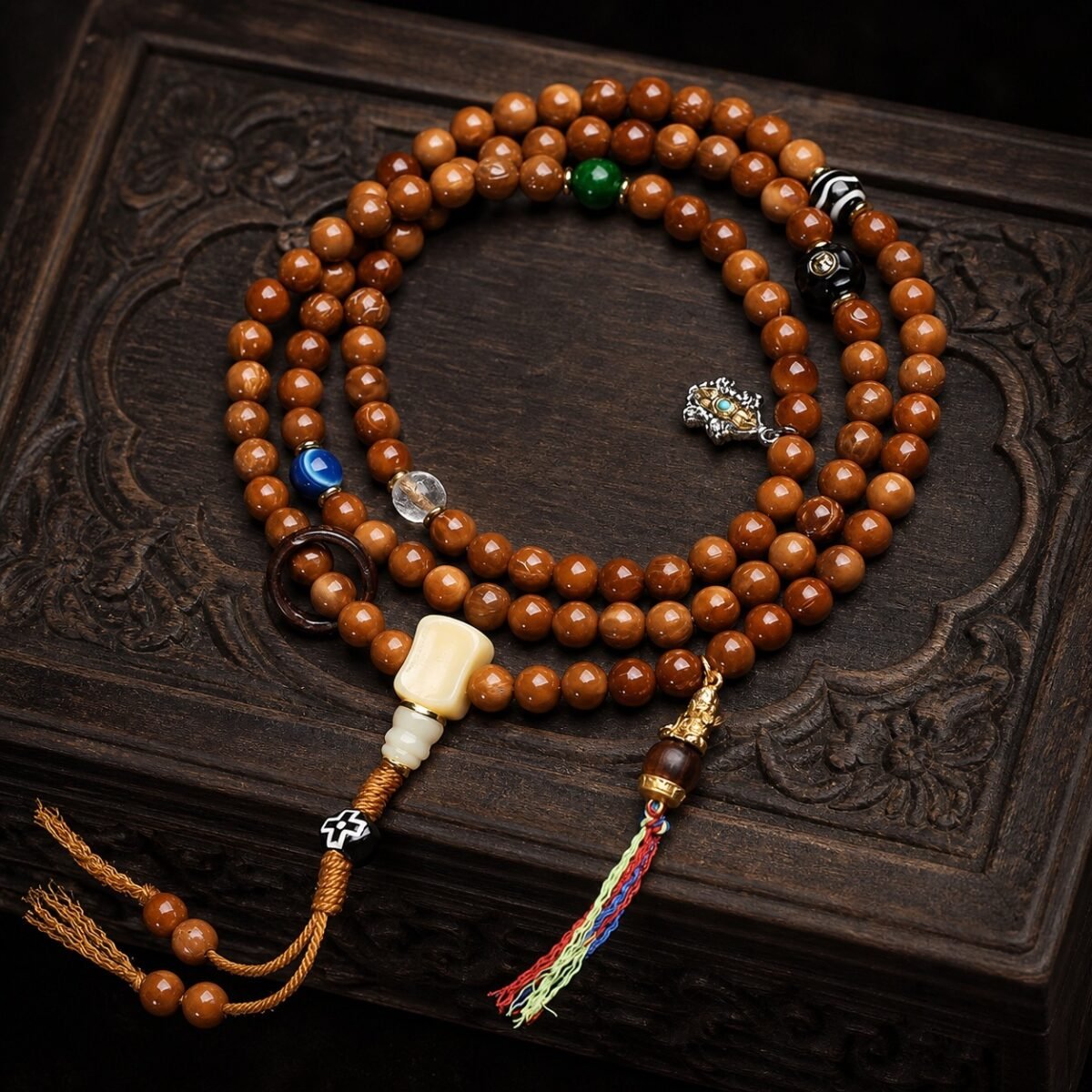 Golden Hour Prayer Mala with 108 amber-brown beads, agate accents, and multicolour tassel