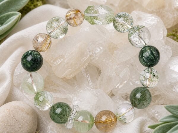 Wealth Flow bracelet with Green Phantom Quartz green rutilated quartz and golden rutilated quartz beads.