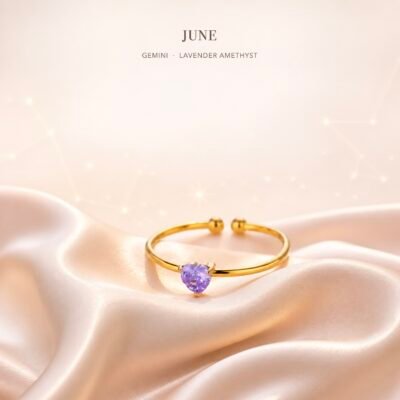June lavender heart ring with pale lavender decorative center and gold-tone open band