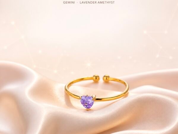 June lavender heart ring with pale lavender decorative center and gold-tone open band