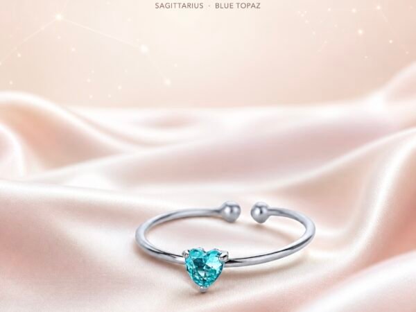 Blue gemstone birthstone heart ring with silver-tone adjustable band