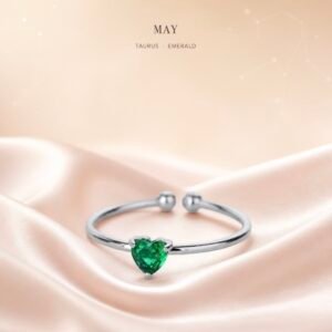 May Fluorite Heart Ring with a heart-shaped green stone and silver-tone adjustable band