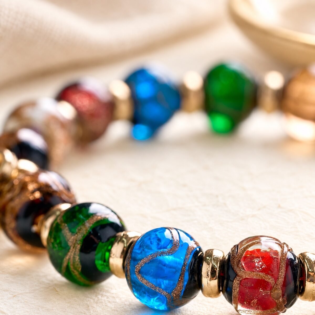 ash-glass-bead-detail-light-background Tibetan Wealth Guardian Car Charm