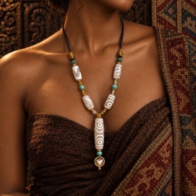 White Eight-Eye Dzi Necklace with white focal bead and adjustable layered cord