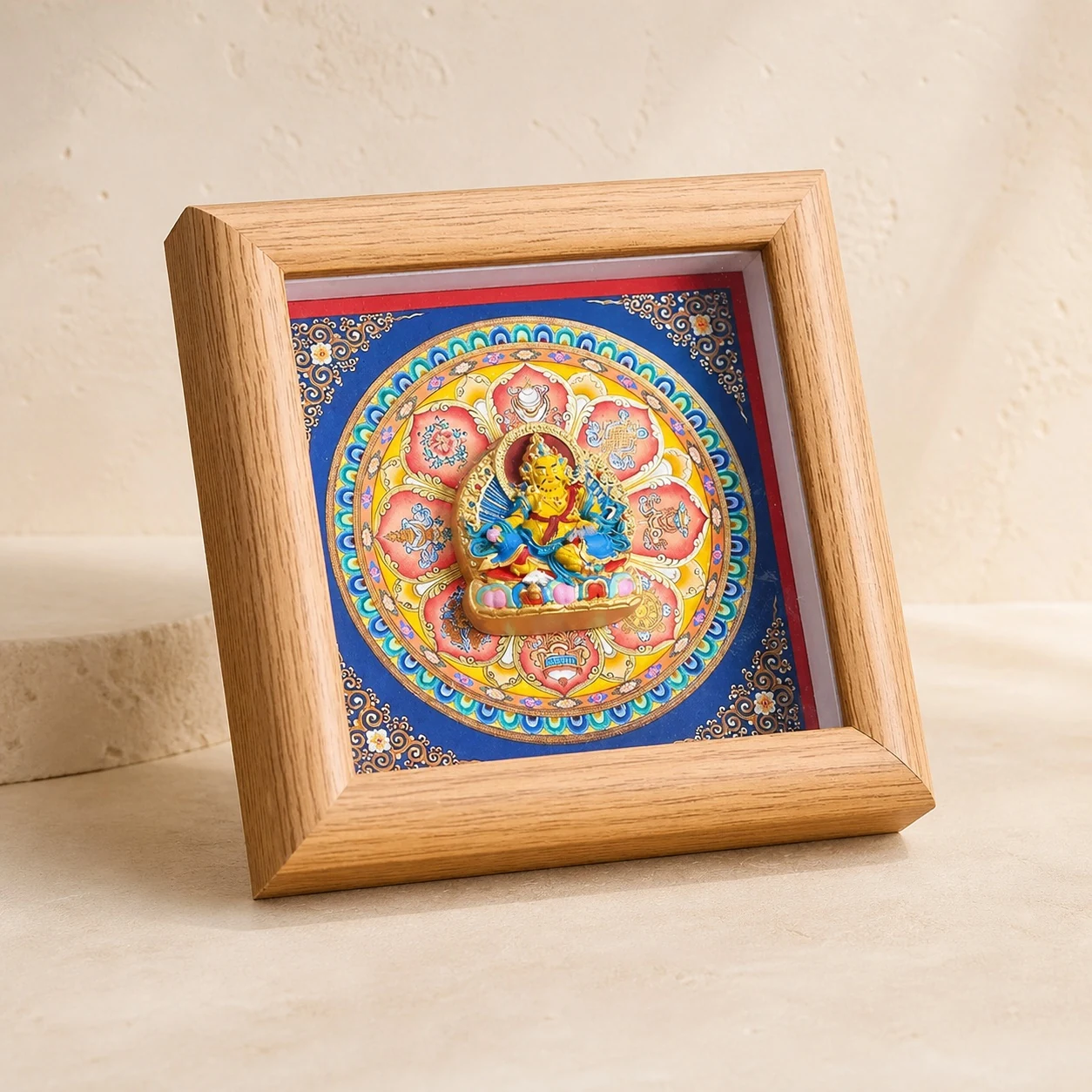 Yellow Jambhala framed deity relief art
