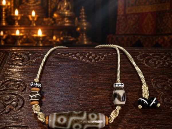 Golden Ember Dzi Necklace with 38 mm aged-patina focal bead and adjustable cord