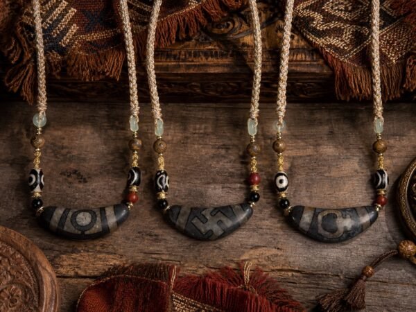 horn-dzi-three-styles-group-exact-original Smoky Umber Bead Necklace with natural-horn Dzi-style focal bead and adjustable cord