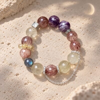 Moonlit Guardian Crystal Bracelet with Purple Phantom Quartz, Rutilated Quartz, Gray Moonstone, and Black-Gold Super Seven beads