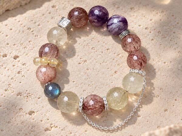 moonlight-guardian-himalayan-crystal-bracelet-01-main-hero-v2 Moonlit Guardian Crystal Bracelet with Purple Phantom Quartz, Rutilated Quartz, Gray Moonstone, and Black-Gold Super Seven beads