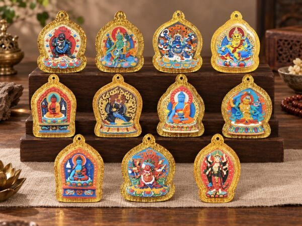 Mini Shrine Pendant with raised hand-painted motif, clear acrylic case, and gold-tone frame