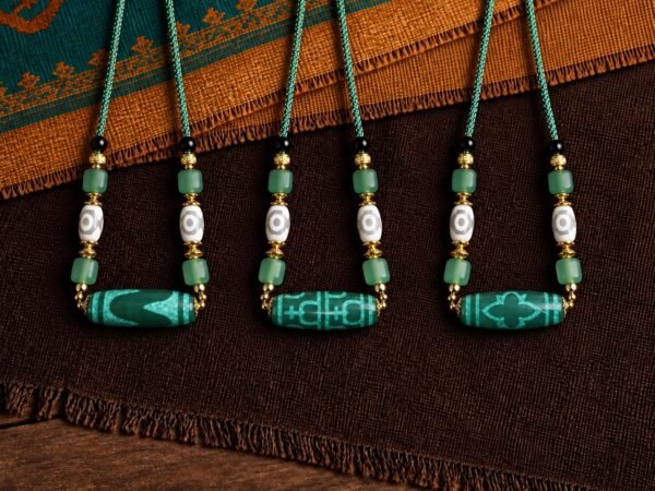 Jade-Green Dzi Necklace with turquoise-coloured focal bead and braided cord